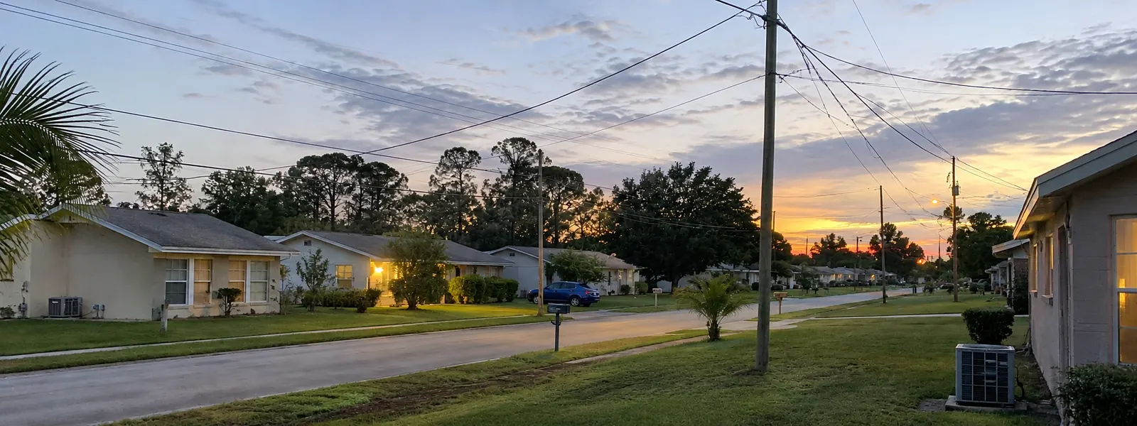 Residential street of single-story homes in Bay County, Florida